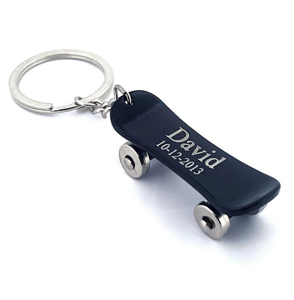 Quality Mini Skateboard Keychain with Spinning Wheels